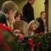 Ann Arbor resident Allison Gaines, nine, looks over the balcony on the upper level of Bethlehem United Church of Christ on Saturday. This is Allison's first Sing Along With Santa. Daniel Brenner I AnnArbor.com